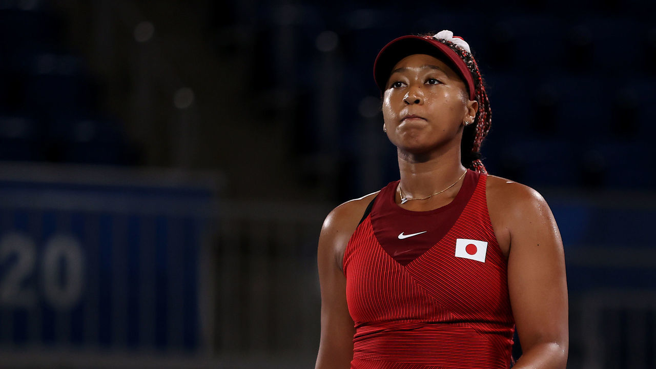 TOKYO, JAPAN - JULY 27: Naomi Osaka of Team Japan prepares to serve during her Women's Singles Third Round match against Marketa Vondrousova of Team Czech Republic on day four of the Tokyo 2020 Olympic Games at Ariake Tennis Park on July 27, 2021 in Tokyo, Japan.