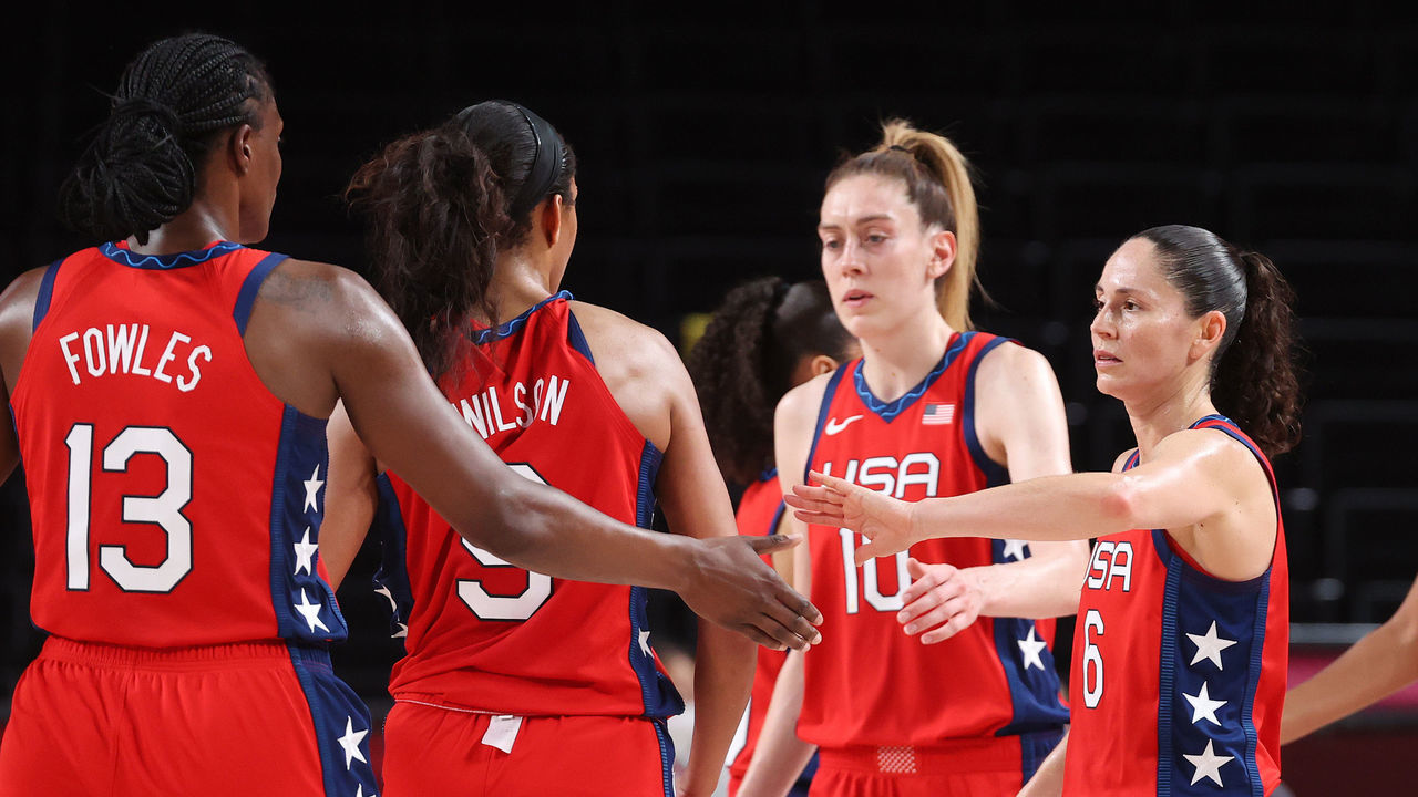 SAITAMA, JAPAN - JULY 27: Sue Bird #6 of Team United States celebrates against Nigeria with teammates Sylvia Fowles #13, A'Ja Wilson #9 and Breanna Stewart #10 during the second half of a Women's Preliminary Round Group B game on day four of the Tokyo 2020 Olympic Games at Saitama Super Arena on July 27, 2021 in Saitama, Japan.