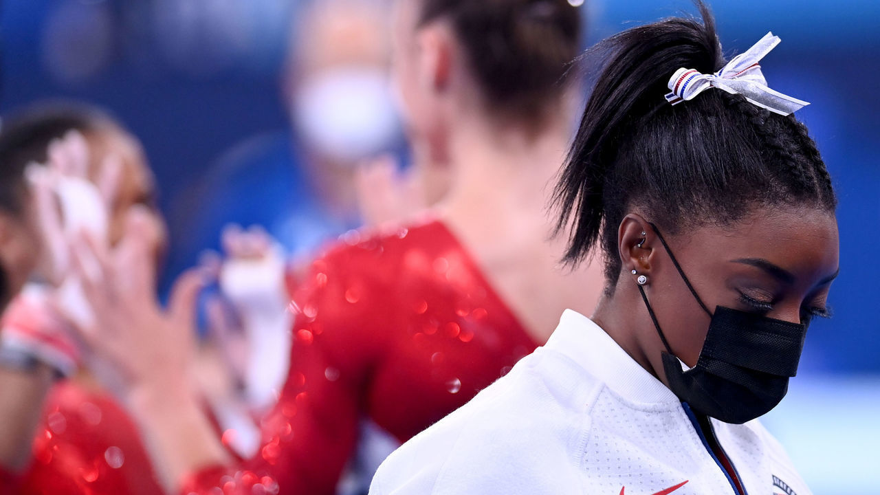 27 July 2021, Japan, Tokio: Gymnastics: Olympics, team, women, final at Ariake Gymnastics Centre: Simone Biles of the USA wears a mask after leaving the team final with an injury. Photo: Marijan Murat/dpa