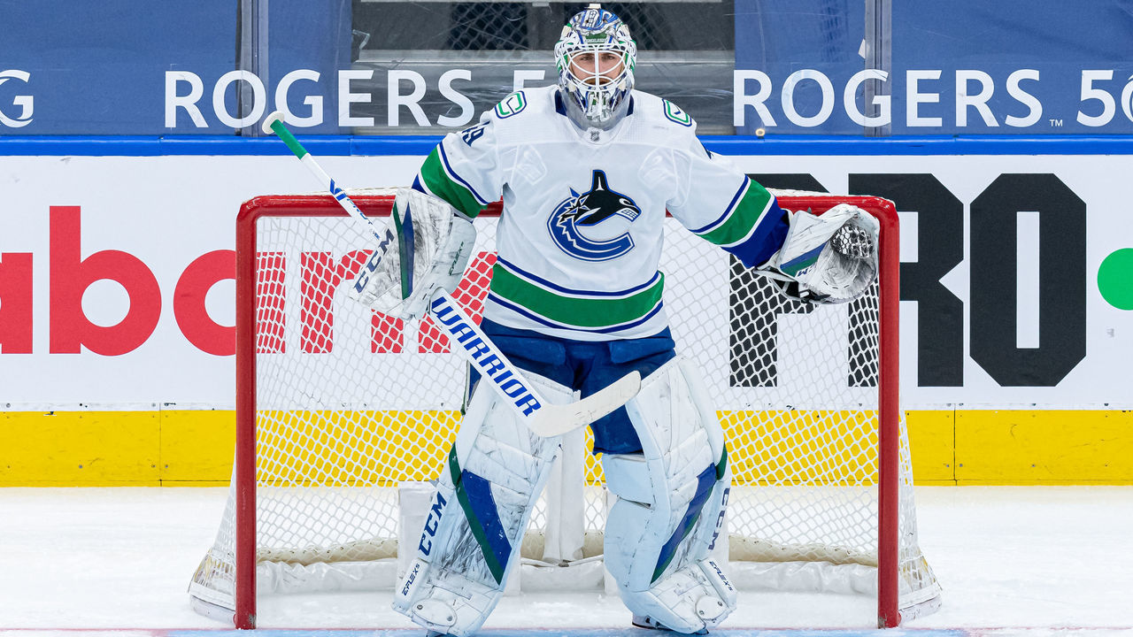 TORONTO, ON - APRIL 29: Vancouver Canucks Goalie Braden Holtby (49) reacts during the NHL regular season game between the Vancouver Canucks and the Toronto Maple Leafs on April 29, 2021, at Scotiabank Arena in Toronto, ON, Canada.