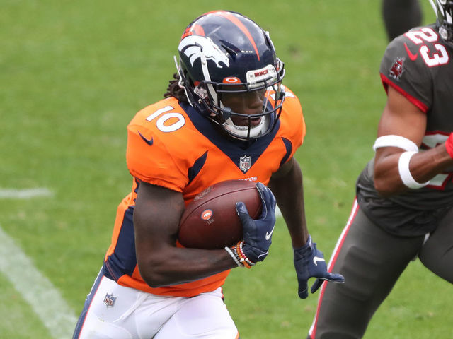 DENVER, COLORADO - SEPTEMBER 27: Wide receiver Jerry Jeudy #10 of the Denver Broncos rushes past cornerback Sean Murphy-Bunting #23 of the Tampa Bay Buccaneers during the first half at Empower Field At Mile High on September 27, 2020 in Denver, Colorado.