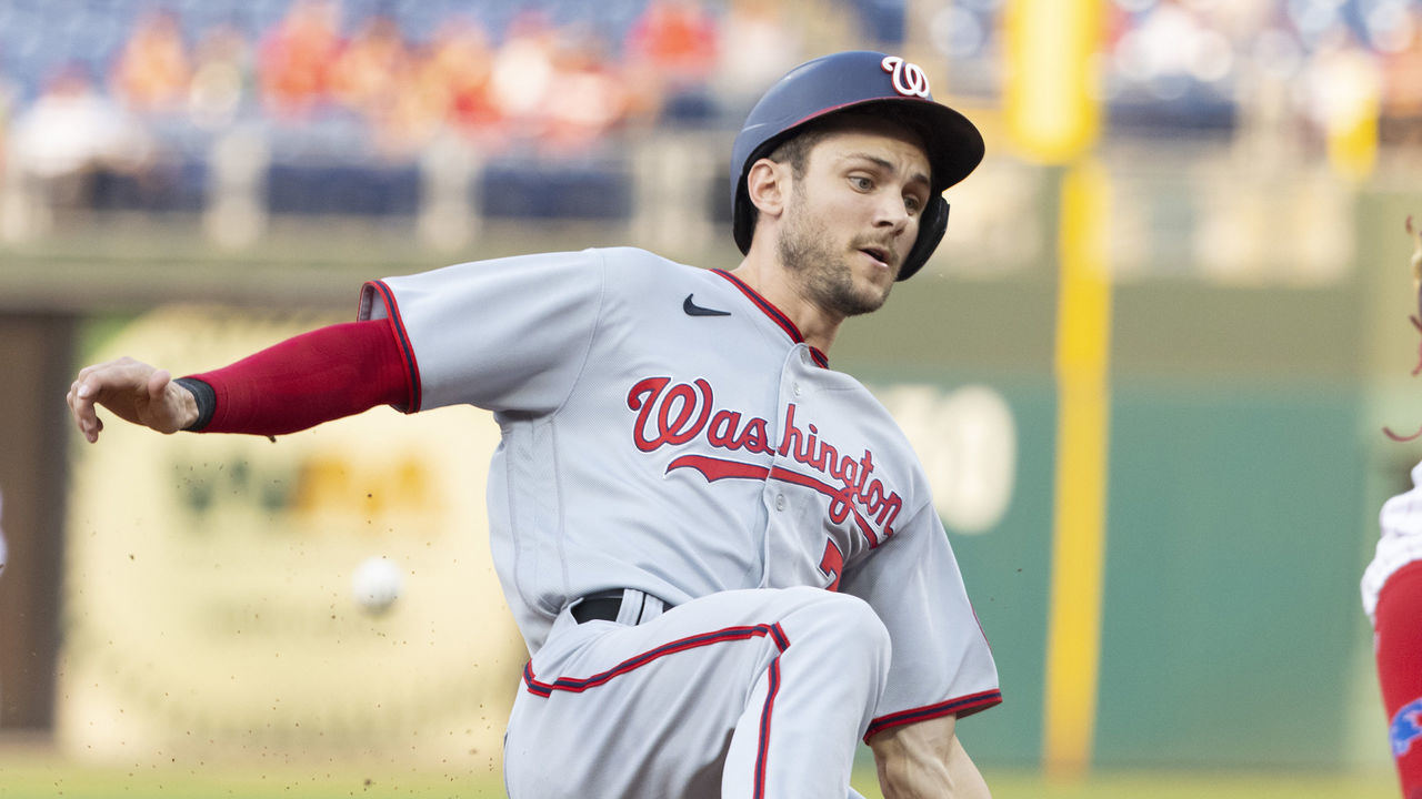PHILADELPHIA, PA - JULY 27: Trea Turner #7 of the Washington Nationals slides safely into third base in the top of the first inning against the Philadelphia Phillies at Citizens Bank Park on July 27, 2021 in Philadelphia, Pennsylvania.