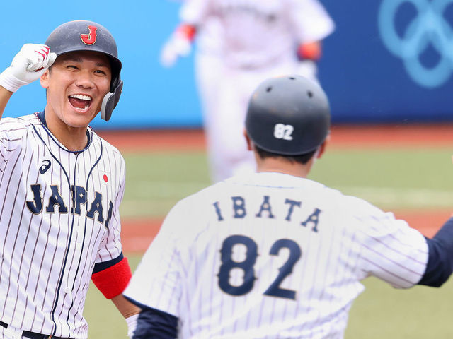 FUKUSHIMA, JAPAN - JULY 28: Hayato Sakamoto #6 of Team Japan celebrates his walk-off single to center field to win 4-3 against Team Dominican Republic during the baseball opening round Group A game on day five of the Tokyo 2020 Olympic Games at Fukushima Azuma Baseball Stadium on July 28, 2021 in Fukushima, Japan.