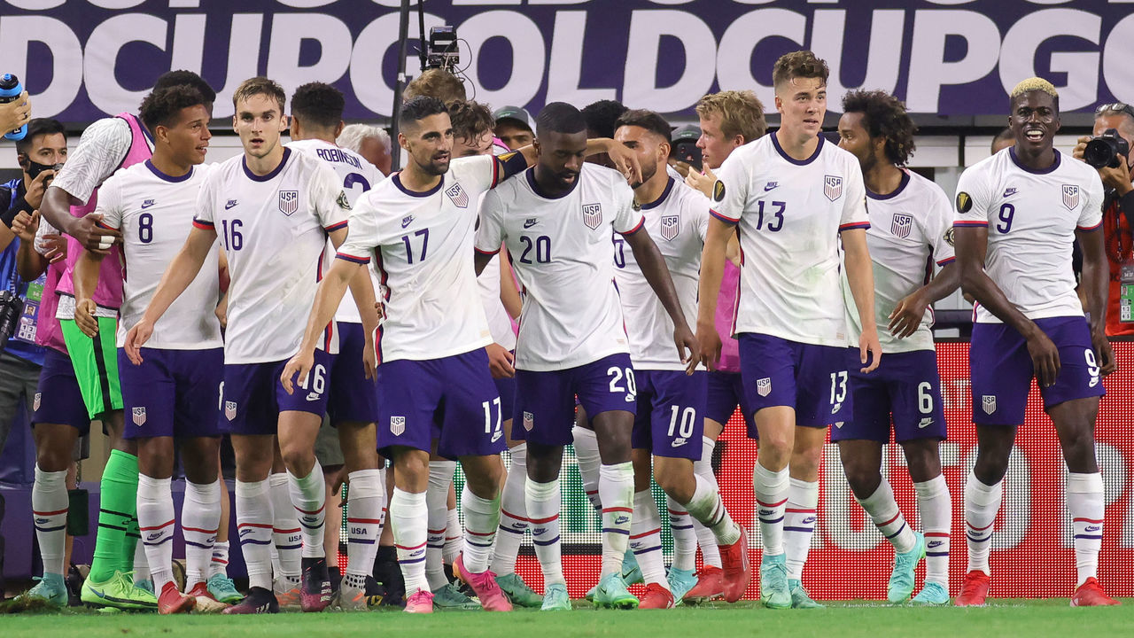 ARLINGTON, TX - JULY 25: United States forward Matthew Hoppe (13) celebrates with fans and teammates after scoring a goal in action during the CONCACAF Gold Cup quarterfinals match between the United Sates and Jamaica on July 25, 2021 at AT&T Stadium in Arlington, TX.