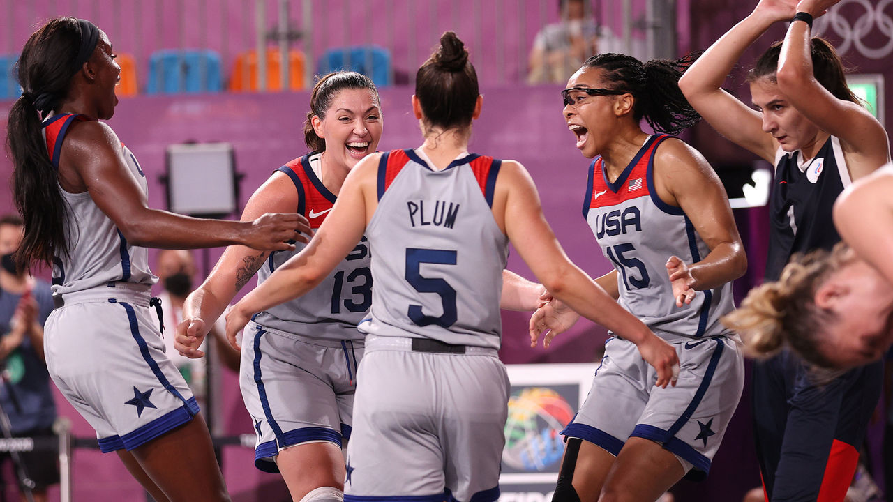 TOKYO, JAPAN - JULY 28: Jacquelyn Young, Stefanie Dolson, Kelsey Plum, and Allisha Gray of Team United States celebrate victory and winning the gold medal in the 3x3 Basketball competition on day five of the Tokyo 2020 Olympic Games at Aomi Urban Sports Park on July 28, 2021 in Tokyo, Japan.