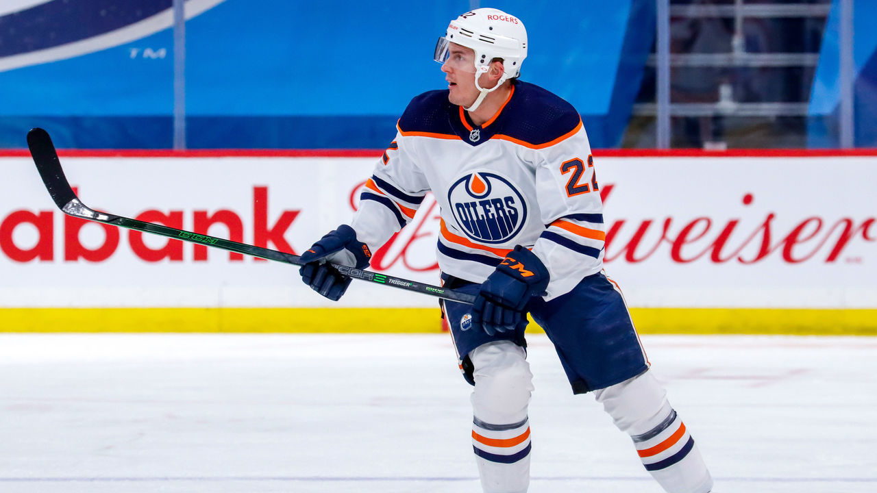 WINNIPEG, MB - APRIL 28: Tyson Barrie #22 of the Edmonton Oilers keeps an eye on the play during first period action against the Winnipeg Jets at Bell MTS Place on April 28, 2021 in Winnipeg, Manitoba.