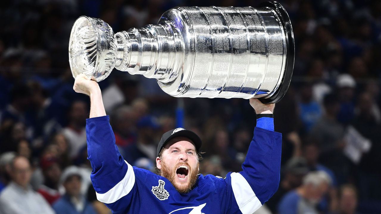 TAMPA, FLORIDA - JULY 07: Blake Coleman #20 of the Tampa Bay Lightning hoists the Stanley Cup after their 1-0 victory in Game Five of the 2021 Stanley Cup Final to win the series four games to one against the Montreal Canadiens at Amalie Arena on July 07, 2021 in Tampa, Florida.