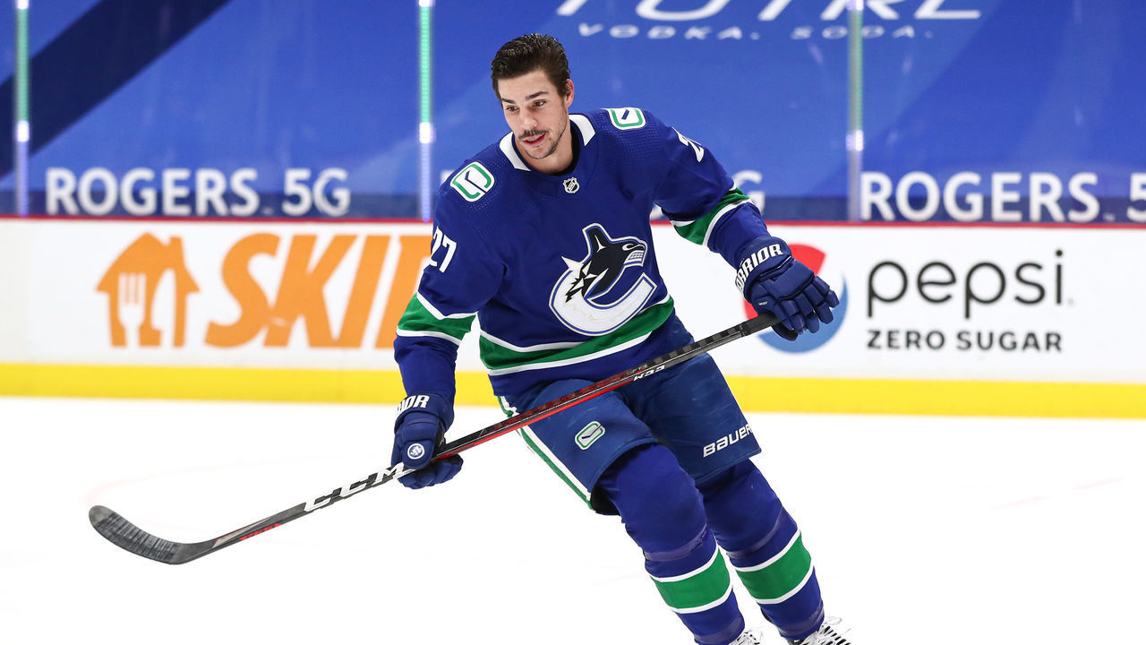 VANCOUVER, BC - MAY 03: Vancouver Canucks Defenceman Travis Hamonic (27) warms up before playing the Edmonton Oilers during their NHL game at Rogers Arena on May 3, 2021 in Vancouver, British Columbia, Canada.