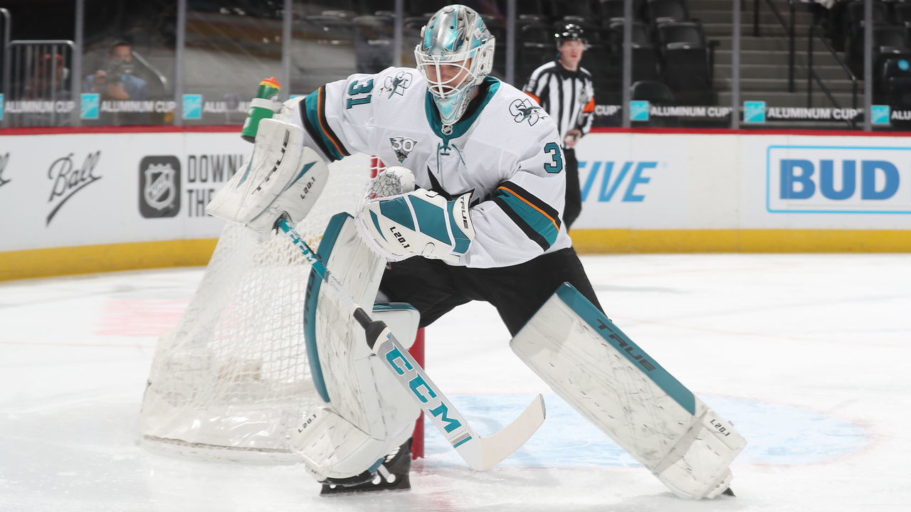 DENVER, COLORADO - APRIL 30: Goaltender Martin Jones #31 of the San Jose Sharks looks to gather the puck against the Colorado Avalanche at Ball Arena on April 30th, 2021 in Denver, Colorado.