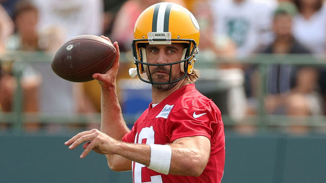 ASHWAUBENON, WISCONSIN - JULY 28: Aaron Rodgers #12 of the Green Bay Packers works out during training camp at Ray Nitschke Field on July 28, 2021 in Ashwaubenon, Wisconsin.