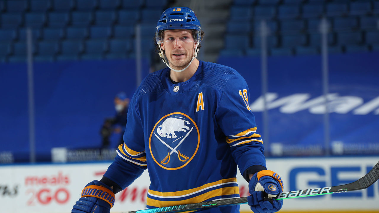 BUFFALO, NY - FEBRUARY 16: Jake McCabe #19 of the Buffalo Sabres prepares for a faceoff against the New York Islanders during an NHL game on February 16, 2021 at KeyBank Center in Buffalo, New York.