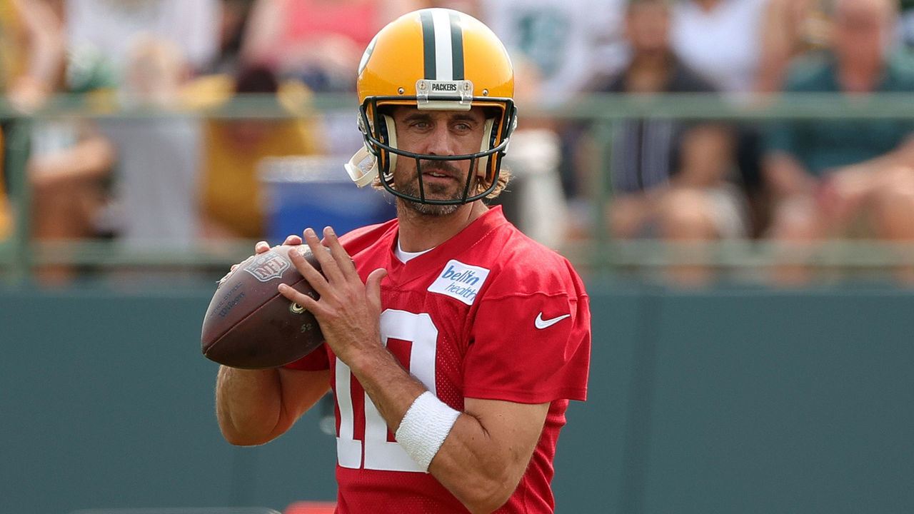 ASHWAUBENON, WISCONSIN - JULY 28: Aaron Rodgers #12 of the Green Bay Packers works out during training camp at Ray Nitschke Field on July 28, 2021 in Ashwaubenon, Wisconsin.