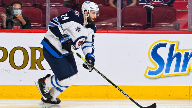 MONTREAL, QC - JUNE 07: Winnipeg Jets defenceman Derek Forbort (24) skates away with the puck during the NHL Stanley Cup Playoffs second round game 4 between the Winnipeg Jets versus the Montreal Canadiens on June 07, 2021, at Bell Centre in Montreal, QC