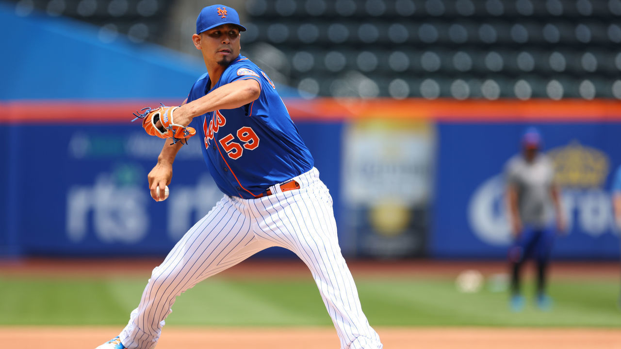 NEW YORK, NY - JULY 10: Pitcher Carlos Carrasco #59 of the New York Mets throws off the mound to live batters before game one of a double header against the Pittsburgh Pirates at Citi Field on July 10, 2021 in New York City.