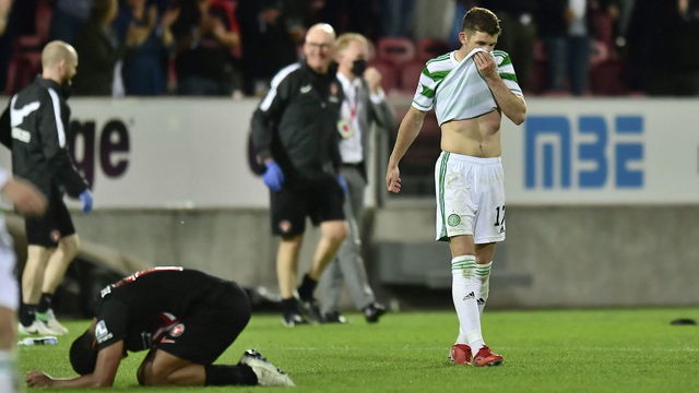Celtic's Scottish midfielder Ryan Christie reacts at the end of the UEFA Champions League second round qualifying football match between FC Midtjylland and Celtic FC at MCH Arena in Herning, Denmark, on July 28, 2021. - - Denmark OUT
