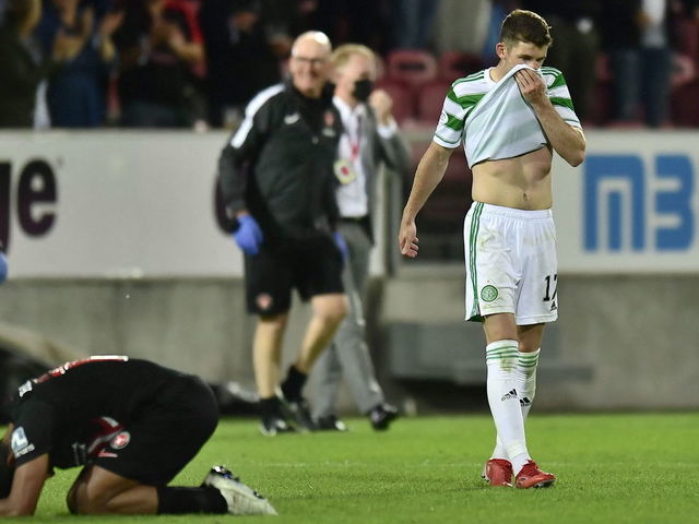 Celtic's Scottish midfielder Ryan Christie reacts at the end of the UEFA Champions League second round qualifying football match between FC Midtjylland and Celtic FC at MCH Arena in Herning, Denmark, on July 28, 2021. - - Denmark OUT