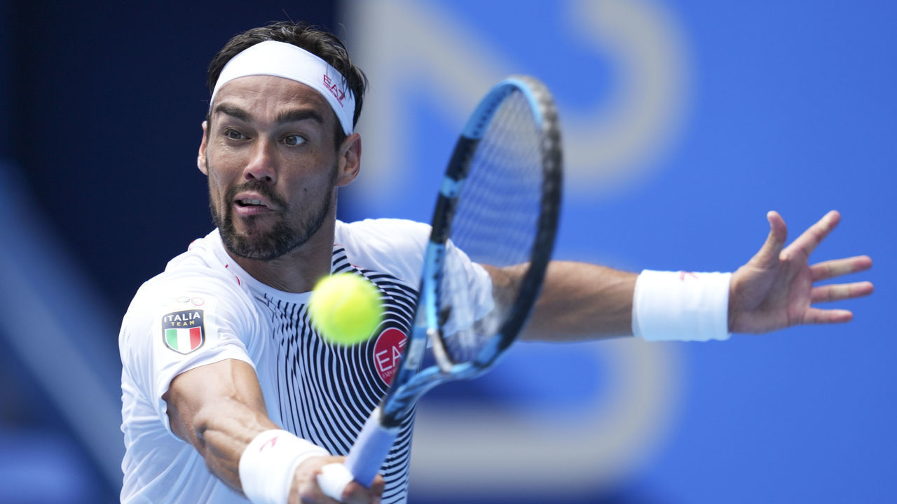 TOKYO, JAPAN - JULY 28: Fabio Fognini of Italy in action against Daniil Medvedev of the Russian Olympic Committee during their Tokyo 2020 Olympic Games men's singles third round tennis match at the Ariake Tennis Park in Tokyo on July 28, 2021.