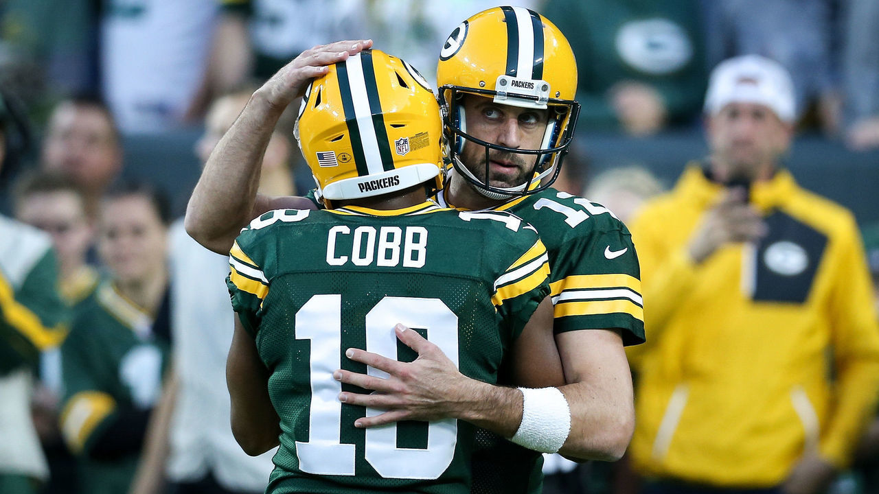 GREEN BAY, WI - SEPTEMBER 09: Randall Cobb #18 and Aaron Rodgers #12 of the Green Bay Packers meet before the game against the Chicago Bears at Lambeau Field on September 9, 2018 in Green Bay, Wisconsin.