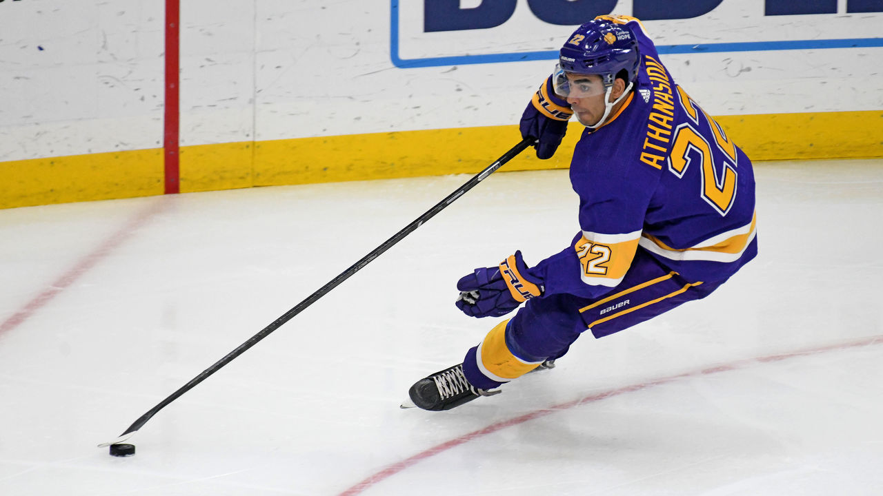 LOS ANGELES, CA - MARCH 17: Los Angeles Kings Winger Andreas Athanasiou (22) carries the puck during an NHL game between the St. Louis Blues and the Los Angeles Kings on March 17, 2021, at the Staples Center in Los Angeles, CA.