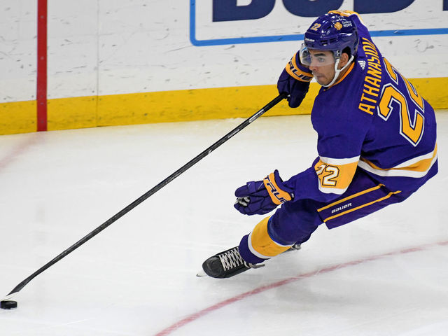 LOS ANGELES, CA - MARCH 17: Los Angeles Kings Winger Andreas Athanasiou (22) carries the puck during an NHL game between the St. Louis Blues and the Los Angeles Kings on March 17, 2021, at the Staples Center in Los Angeles, CA.