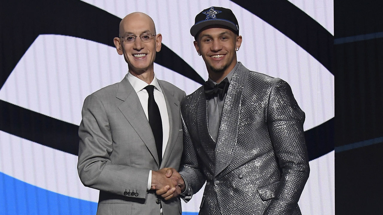 BROOKLYN, NY - JULY 29: Jalen Suggs shakes hands with NBA Commissioner Adam Silver after being selected number five overall by the Orlando Magic during the 2021 NBA Draft on July 29, 2021 at Barclays Center in Brooklyn, New York. Mandatory Copyright Notice: Copyright 2021 NBAE
