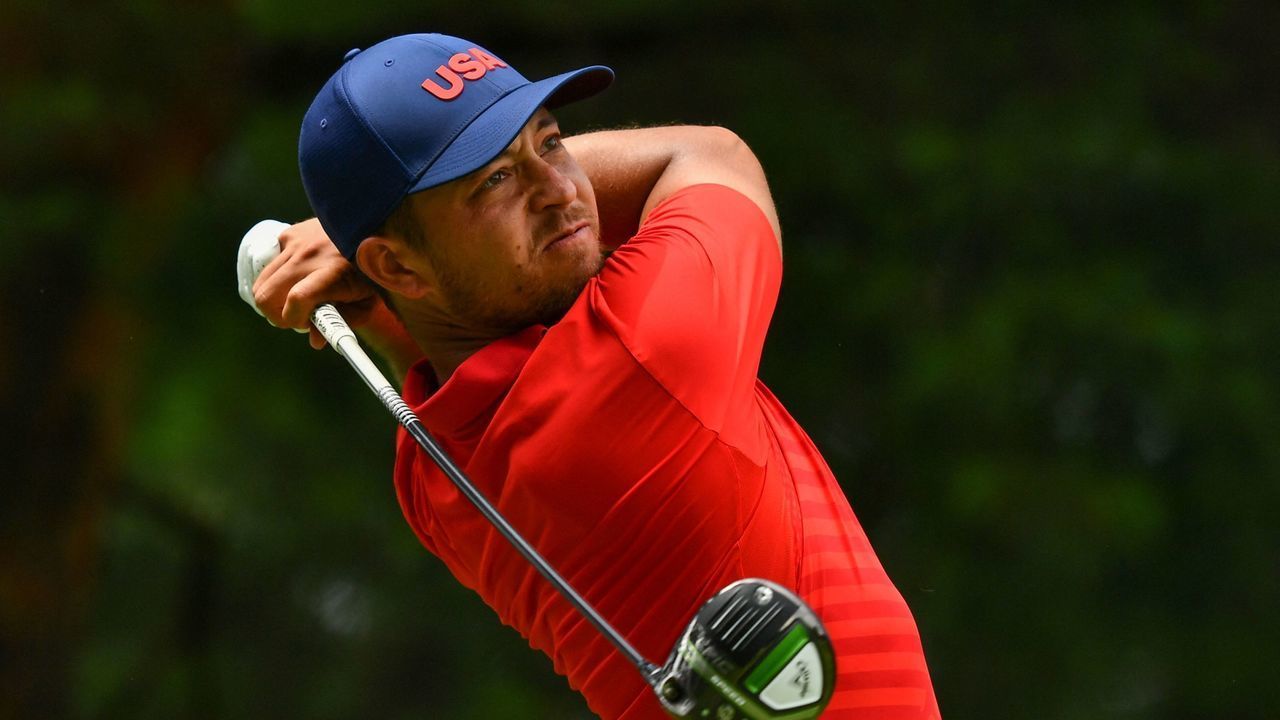USA's Xander Schauffele watches his drive from the 5th tee in round 2 of the mens golf individual stroke play during the Tokyo 2020 Olympic Games at the Kasumigaseki Country Club in Kawagoe on July 30, 2021.