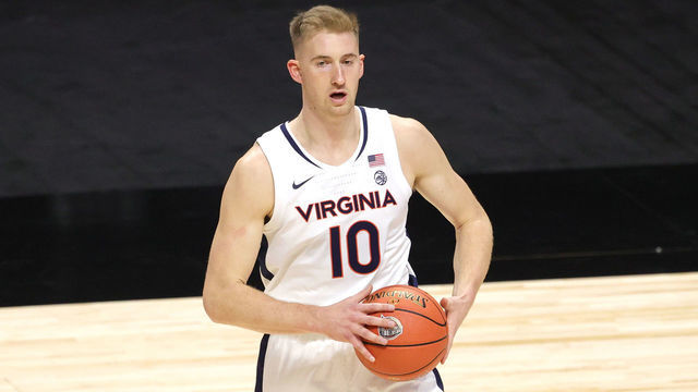 UNCASVILLE, CONNECTICUT - NOVEMBER 25: Sam Hauser #10 of the Virginia Cavaliers looks to pass against the Towson Tigers during the first half at Mohegan Sun Arena on November 25, 2020 in Uncasville, Connecticut.