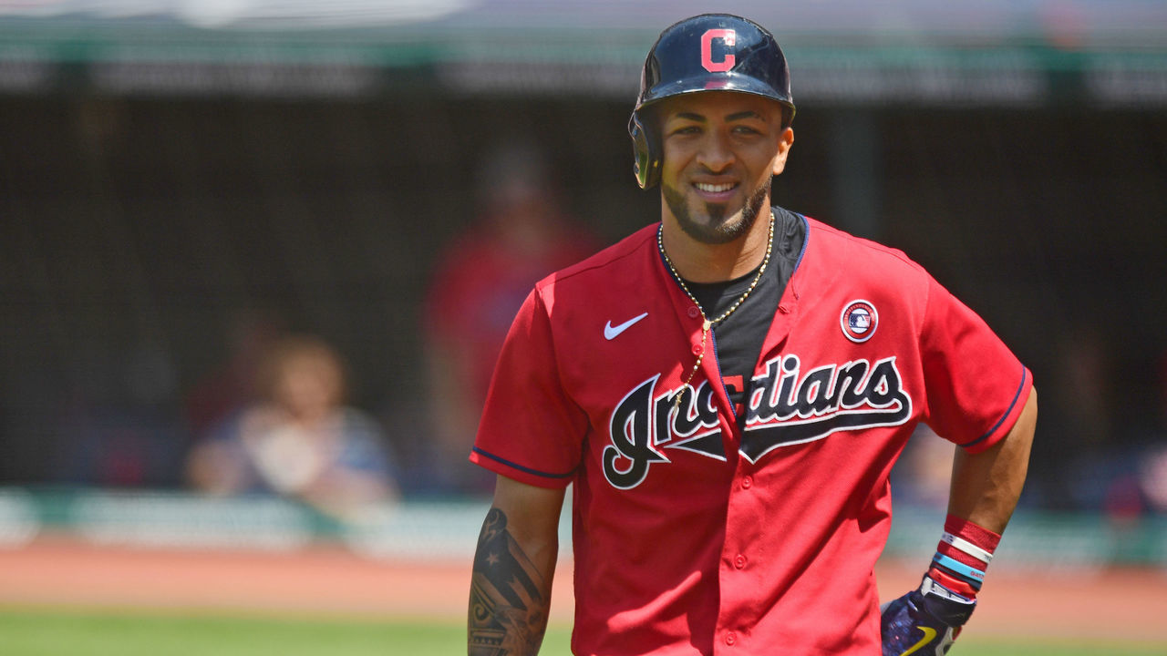 CLEVELAND, OH - JULY 04, 2021: Eddie Rosario #9 of the Cleveland Indians walks back to the dugout after hitting a solo home run off Zack Greinke #21 of the Houston Astros in the sixth inning at Progressive Field on July 4, 2021 in Cleveland, Ohio.