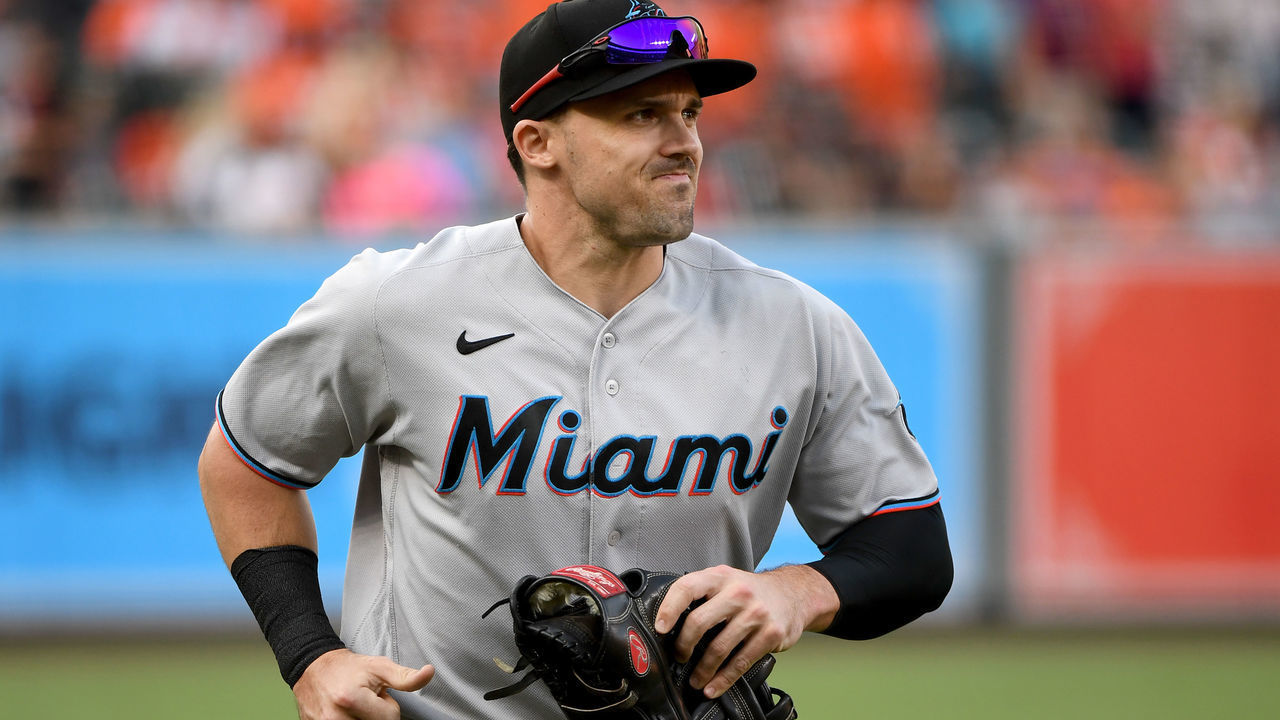BALTIMORE, MARYLAND - JULY 27: Adam Duvall #14 of the Miami Marlins warms up prior to the game against the Baltimore Orioles at Oriole Park at Camden Yards on July 27, 2021 in Baltimore, Maryland.