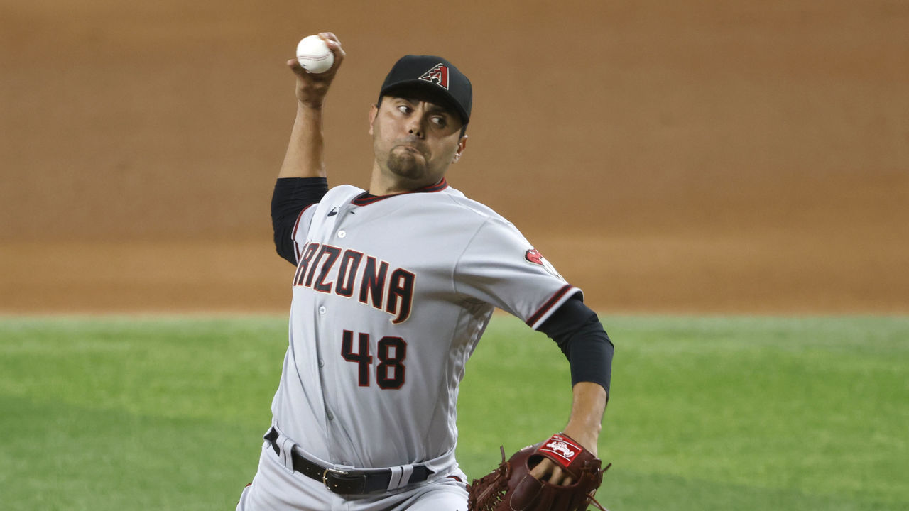 ARLINGTON, TX - JULY 28: Joakim Soria #48 of the Arizona Diamondbacks pitches against the Texas Rangers during the eighth inning at Globe Life Field on July 28, 2021 in Arlington, Texas.