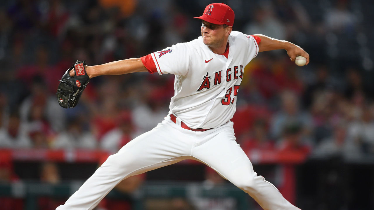 ANAHEIM, CA - JULY 28: Tony Watson #35 of the Los Angeles Angels pitches in the eighth inning of the game against the Colorado Rockies at Angel Stadium of Anaheim on July 28, 2021 in Anaheim, California.