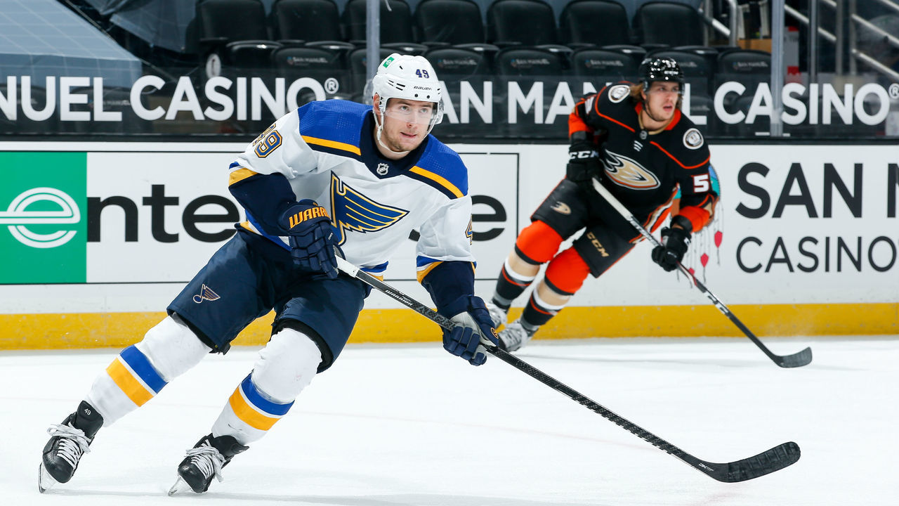 ANAHEIM, CA - JANUARY 31: Ivan Barbashev #49 of the St. Louis Blues and Max Comtois #53 of the Anaheim Ducks skate during the first period of the game at Honda Center on January 31, 2021 in Anaheim, California.
