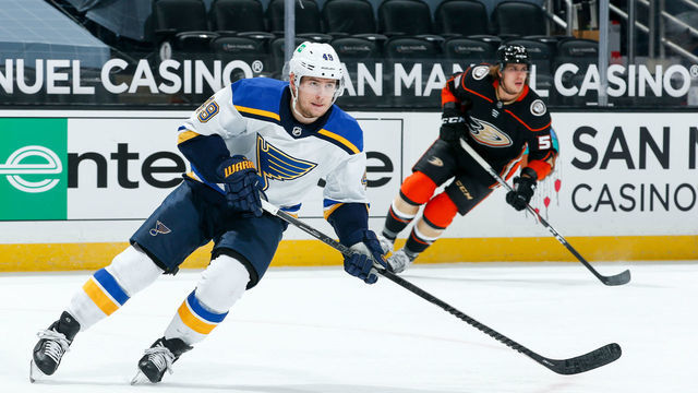 ANAHEIM, CA - JANUARY 31: Ivan Barbashev #49 of the St. Louis Blues and Max Comtois #53 of the Anaheim Ducks skate during the first period of the game at Honda Center on January 31, 2021 in Anaheim, California.