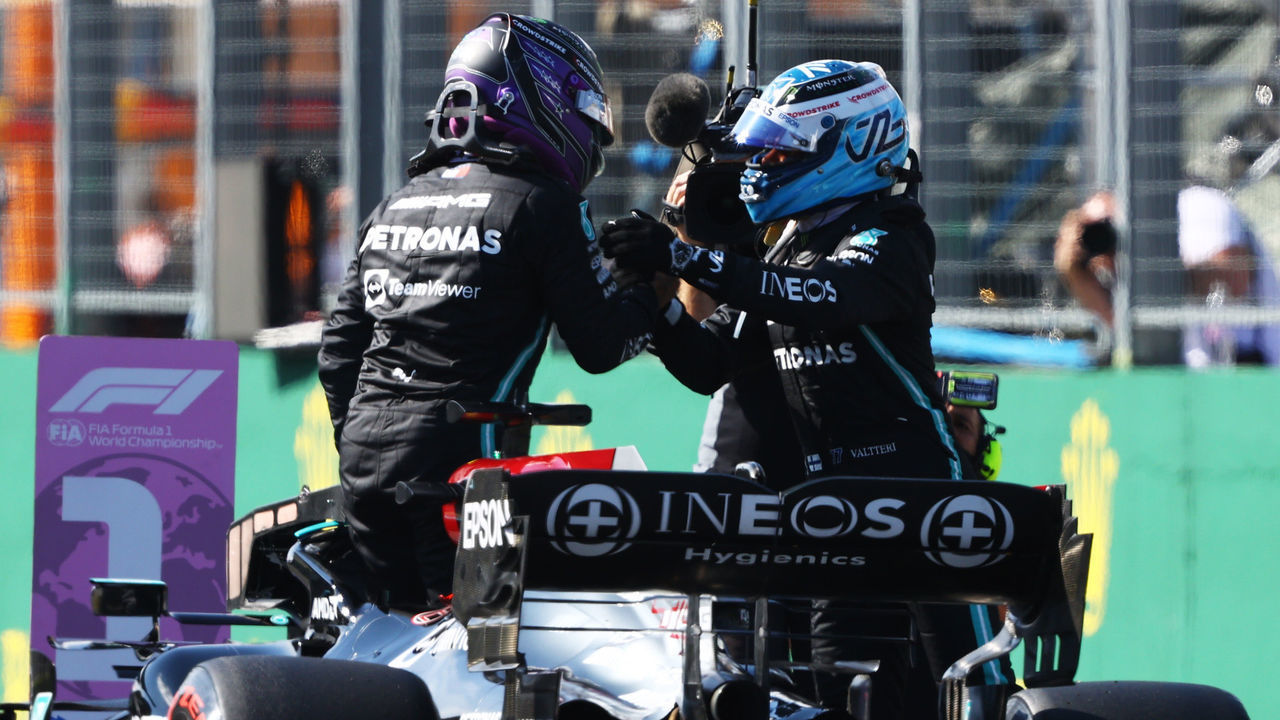 BUDAPEST, HUNGARY - JULY 31: Pole position qualifier Lewis Hamilton of Great Britain and Mercedes GP and second place qualifier Valtteri Bottas of Finland and Mercedes GP celebrate in parc ferme during qualifying ahead of the F1 Grand Prix of Hungary at Hungaroring on July 31, 2021 in Budapest, Hungary.