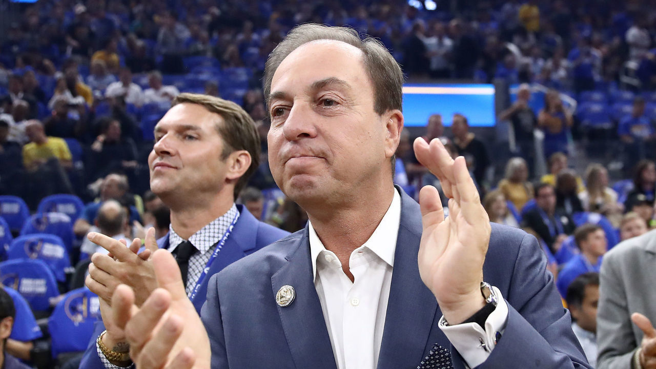 SAN FRANCISCO, CALIFORNIA - OCTOBER 24: (L-R) Golden State Warriors owners Joe Lacob and Peter Guber stand with team president and COO Rick Welts before their game against the LA Clippers at Chase Center on October 24, 2019 in San Francisco, California.