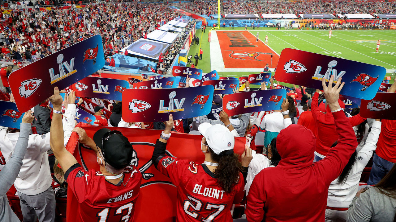 TAMPA, FLORIDA - FEBRUARY 07: Fans are seen cheering from the stands during the second quarter of the game between the Tampa Bay Buccaneers and the Kansas City Chiefs in Super Bowl LV at Raymond James Stadium on February 07, 2021 in Tampa, Florida.