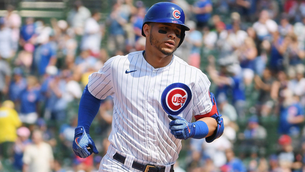 CHICAGO, ILLINOIS - JULY 29: Willson Contreras #40 of the Chicago Cubs hits a two run home run in the sixth inning against the Cincinnati Reds at Wrigley Field on July 29, 2021 in Chicago, Illinois.