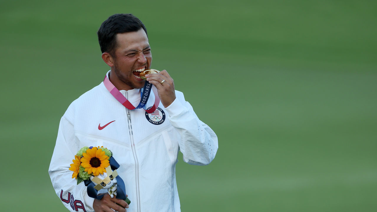 KAWAGOE, JAPAN - AUGUST 01: Xander Schauffele of Team United States celebrates with the gold medal during the medal ceremony after the final round of the Men's Individual Stroke Play on day nine of the Tokyo 2020 Olympic Games at Kasumigaseki Country Club on August 01, 2021 in Kawagoe, Saitama, Japan.