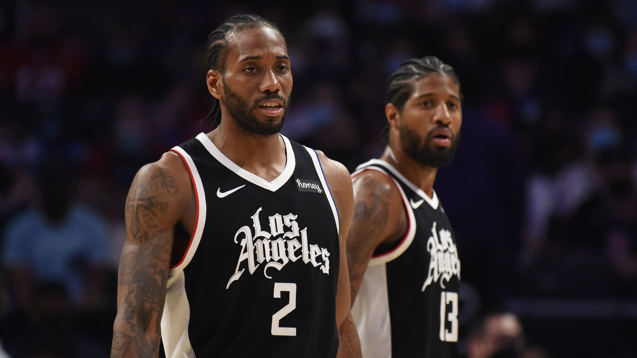 LOS ANGELES, CA - JUNE 12: Kawhi Leonard #2 of the LA Clippers and Paul George #13 of the LA Clippers looks on during Round 2, Game 3 of the 2021 NBA Playoffs on June 12, 2021 at STAPLES Center in Los Angeles, California. NOTE TO USER: User expressly acknowledges and agrees that, by downloading and/or using this Photograph, user is consenting to the terms and conditions of the Getty Images License Agreement. Mandatory Copyright Notice: Copyright 2021 NBAE