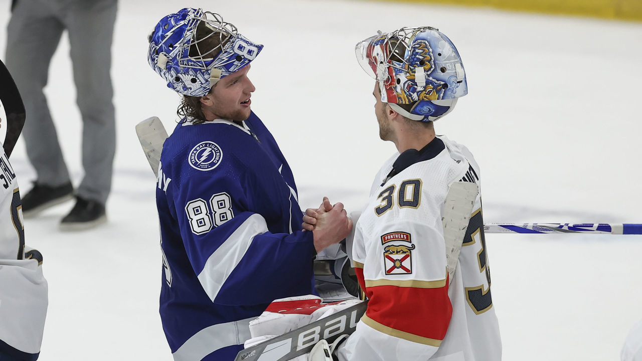 TAMPA, FL - MAY 26: Tampa Bay Lightning goaltender Andrei Vasilevskiy (88) and Florida Panthers goaltender Spencer Knight (30) shake hands after Game 6 of the First Round of the NHL Play-offs between the Florida Panthers and Tampa Bay Lightning on May 26, 2021 at Amalie Arena in Tampa, FL.