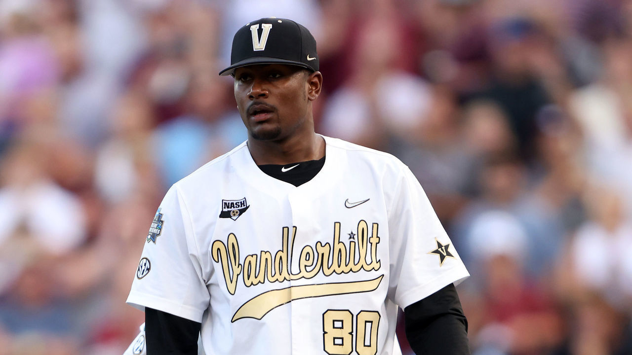 OMAHA, NEBRASKA - JUNE 30: Starting pitcher Kumar Rocker #80 of the Vanderbilt reacts to being pulled from the game against Mississippi St. by Head Coach Tim Corbin of the Vanderbilt in the top of the fifth inning during game three of the College World Series Championship at TD Ameritrade Park Omaha on June 30, 2021 in Omaha, Nebraska.