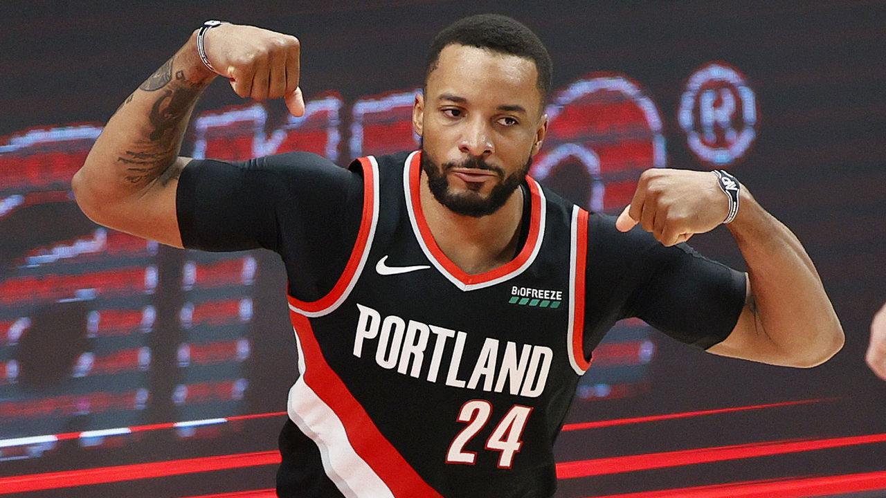 PORTLAND, OREGON - MAY 29: Norman Powell #24 of the Portland Trail Blazers flexes after his basket against Nikola Jokic #15 of the Denver Nuggets in the third quarter during Round 1, Game 4 of the 2021 NBA Playoffs at Moda Center on May 29, 2021 in Portland, Oregon.