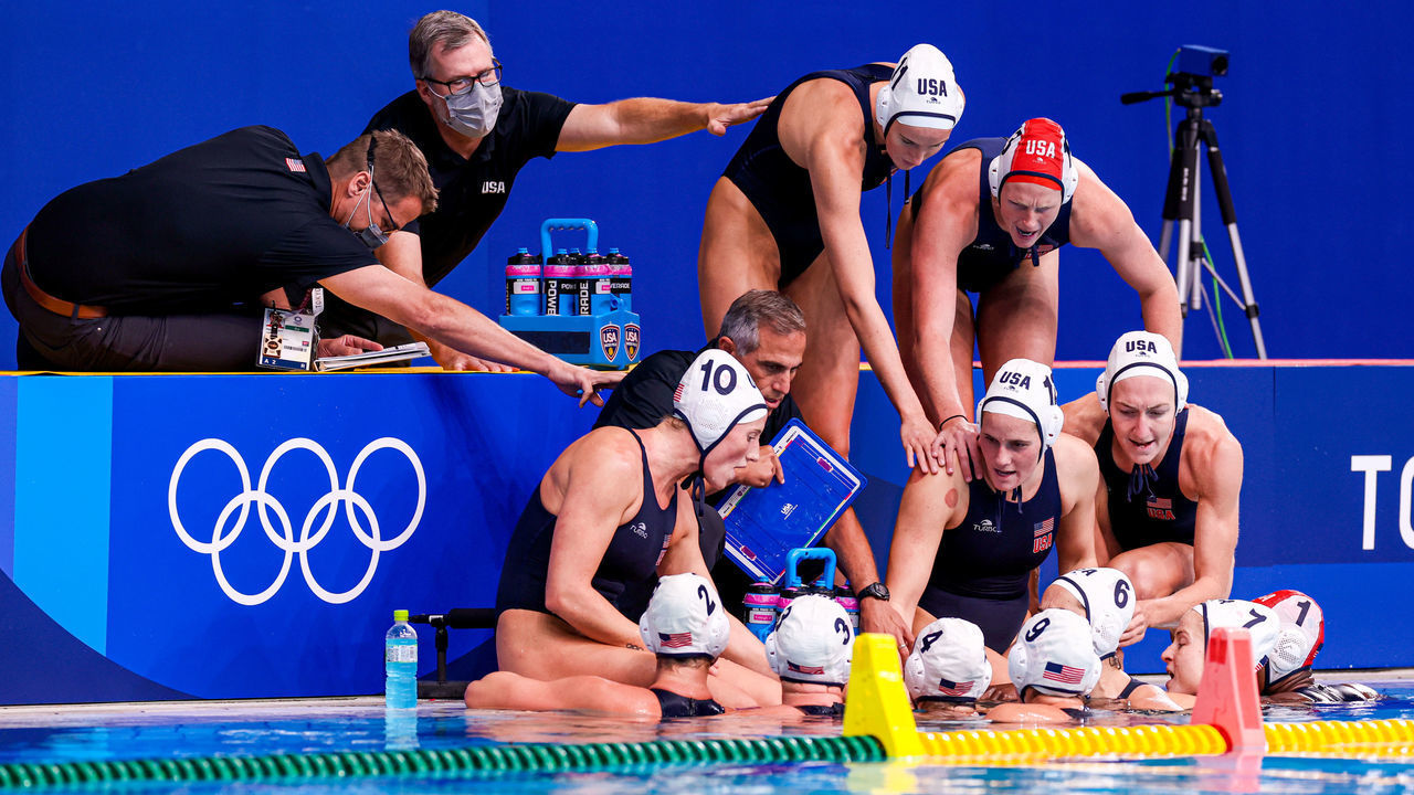 TOKYO, JAPAN - JULY 26: Daniel Klatt of United States, Christopher Oeding of United States, Kaleigh Gilchrist of United States, Head Coach Adam Krikorian of United States, Makenzie Fischer of United States, Amanda Longan of United States, Alys Williams of United States during the Tokyo 2020 Olympic Waterpolo Tournament Women match between Team United States and Team China at Tatsumi Waterpolo Centre on July 26, 2021 in Tokyo, Japan