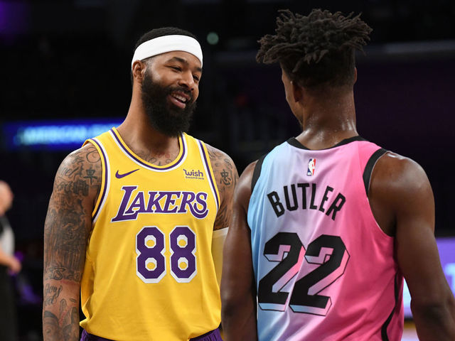 LOS ANGELES, CA - FEBRUARY 20: Markieff Morris #88 of the Los Angeles Lakers talks with Jimmy Butler #22 of the Miami Heat during the game on February 20, 2021 at STAPLES Center in Los Angeles, California. NOTE TO USER: User expressly acknowledges and agrees that, by downloading and/or using this Photograph, user is consenting to the terms and conditions of the Getty Images License Agreement. Mandatory Copyright Notice: Copyright 2021 NBAE