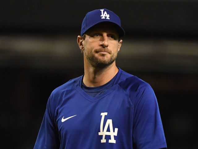 PHOENIX, ARIZONA - JULY 31: Max Scherzer #31 of the Los Angeles Dodgers walks off the field after a game against the Arizona Diamondbacks at Chase Field on July 31, 2021 in Phoenix, Arizona. Dodgers won 8-3.