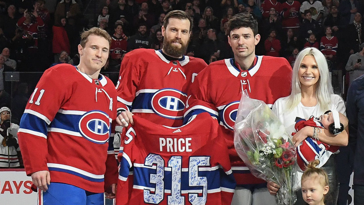 MONTREAL, QC - MARCH 16: Carey Price #31 of the Montreal Canadiens receives the 315th victory jersey from Shea Weber #6 and Brendan Gallagher #11 during his 315th victory ceremony prior to the NHL game against the Chicago Blackhawk at the Bell Centre on March 16, 2019 in Montreal, Quebec, Canada.