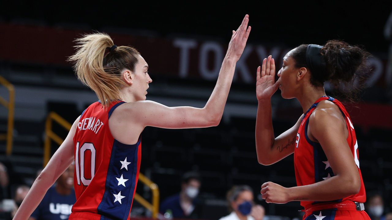 SAITAMA, JAPAN - AUGUST 04: Breanna Stewart #10 of Team United States high-fives teammate A'Ja Wilson #9 during the first half of a Women's Basketball Quarterfinals game on day twelve of the Tokyo 2020 Olympic Games at Saitama Super Arena on August 04, 2021 in Saitama, Japan.