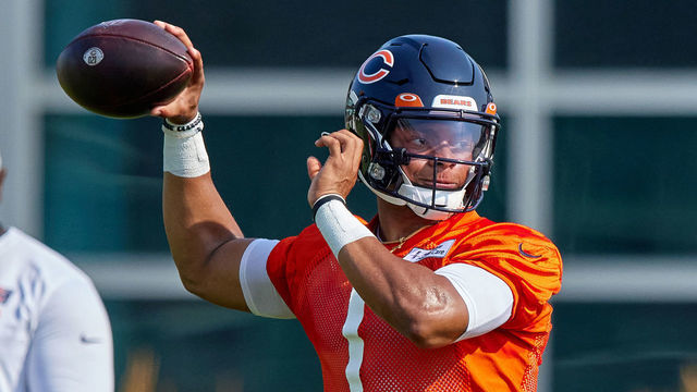 LAKE FOREST, IL - JULY 29: Chicago Bears quarterback Justin Fields (1) throws the football in action during the Chicago Bears training camp on July 29, 2021 at Halas Hall in Lake Forest, IL.