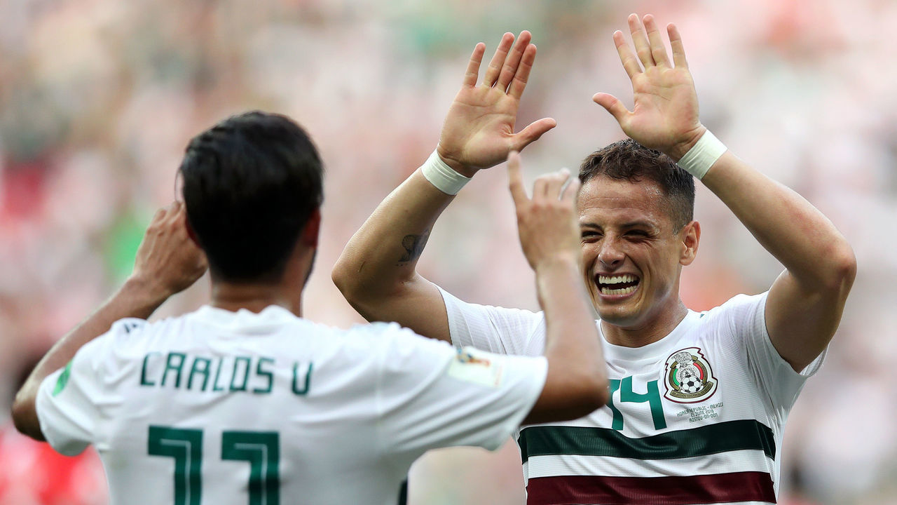 ROSTOV-ON-DON, RUSSIA - JUNE 23: Carlos Vela of Mexico celebrates with teammate Javier Hernandez after scoring a penalty for his team's first goal during the 2018 FIFA World Cup Russia group F match between Korea Republic and Mexico at Rostov Arena on June 23, 2018 in Rostov-on-Don, Russia.
