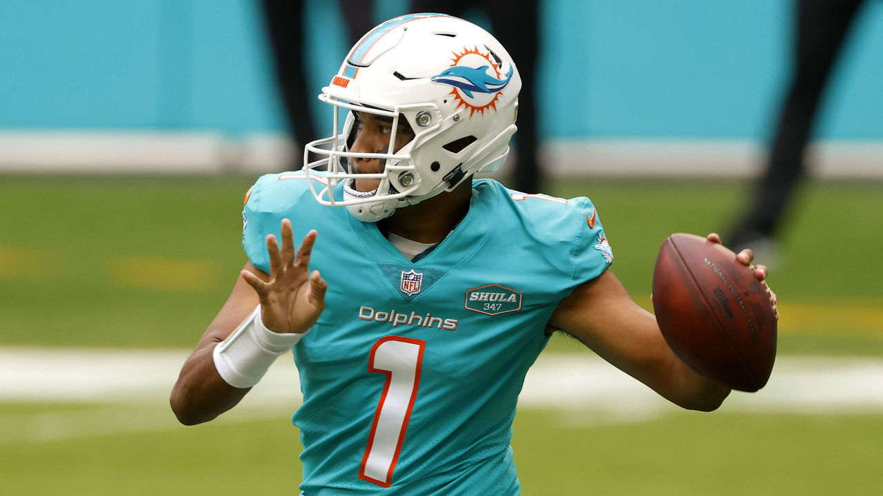 MIAMI GARDENS, FLORIDA - DECEMBER 06: Quarterback Tua Tagovailoa #1 of the Miami Dolphins looks to make a pass play in the first half of the game against the Cincinnati Bengals at Hard Rock Stadium on December 06, 2020 in Miami Gardens, Florida.